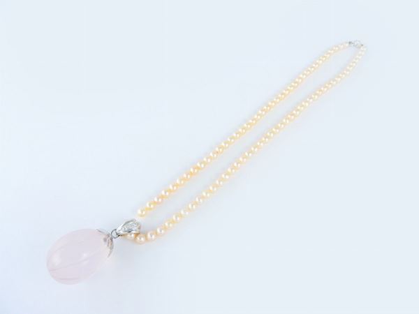 Cultured pearls necklace with white gold, diamonds and pink quartz pendant