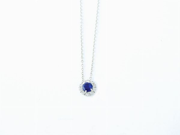 White gold open cable chain necklace with white gold, diamonds and sapphire pendant