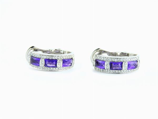 White gold earrings with diamonds and amethyst quartzes