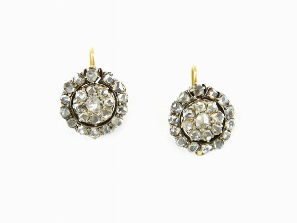 Yellow gold and silver button earrings with diamonds