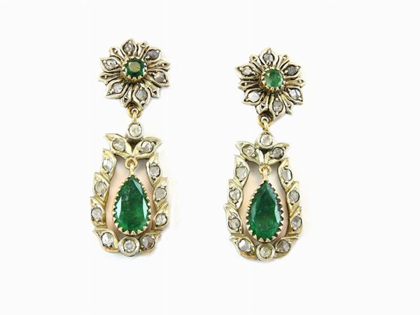 Yellow gold and silver ear pendants with diamonds and emeralds