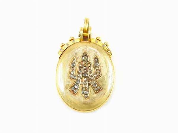 Pendente portaritratti in oro giallo e diamanti