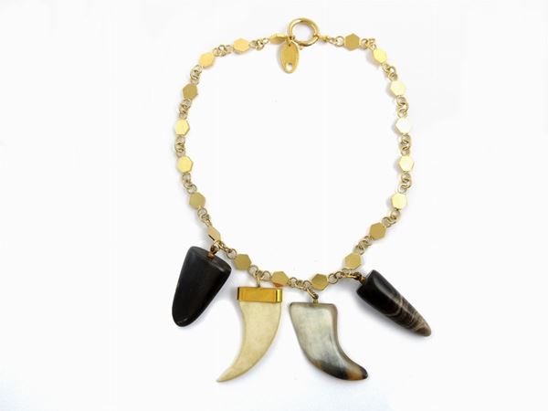Goldtone metal collar and bone, Bijoux Bozart