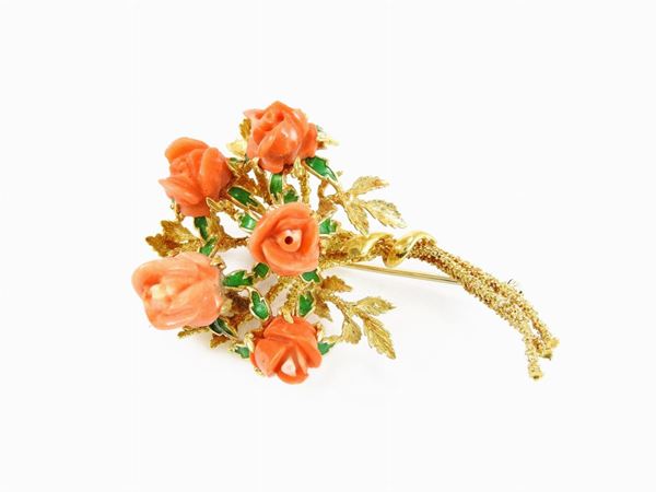 Yellow gold brooch with green enamels and orange red corals