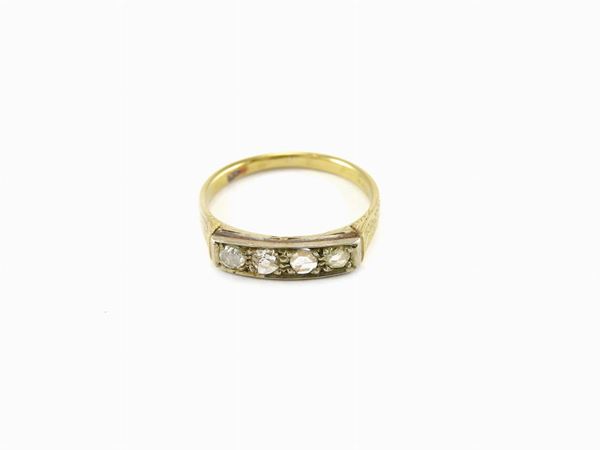 White and yellow gold band ring with diamonds