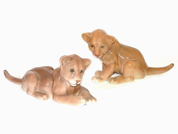 Two Porcelain Lion Cubs
