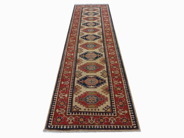 A Kazac Long Carpet