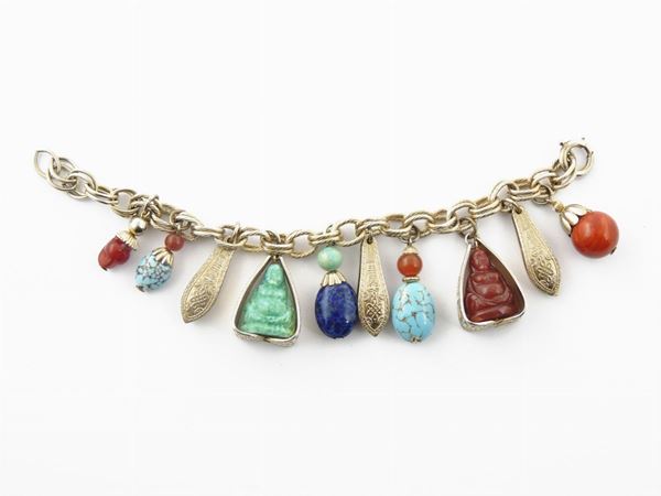 Goldtone metal and glass charms bracelet, Napier