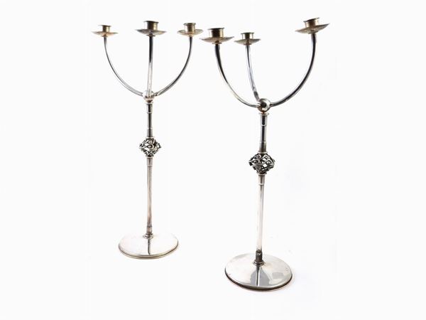 A Pair of Silver Candelabra