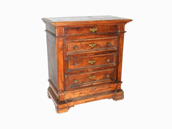 A Walnut Chest of Drawers