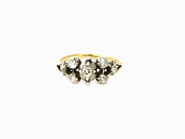 SIlver and yellow gold pinky ring with diamonds