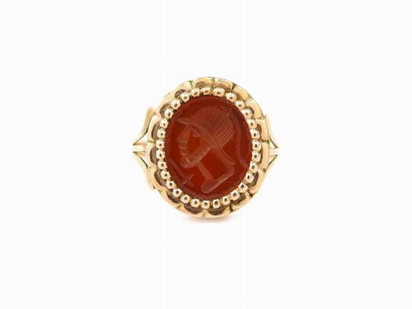 Low alloyed pink gold ring with engraved carnelian