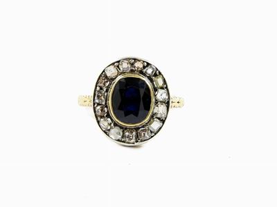 Anello a Margherita in Oro Giallo e Bianco con Diamanti e Zaffiro