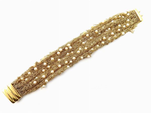 Yellow gold UnoAErre bracelet with Akoya cultured pearls