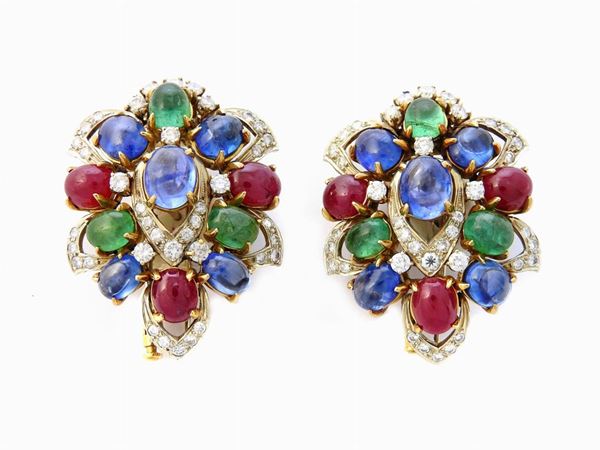 Pair of white and yellow gold "tutti frutti" brooches with diamonds, rubies, sapphires and emeralds