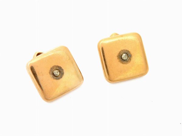 Pair of yellow gold front shirt buttons with diamonds
