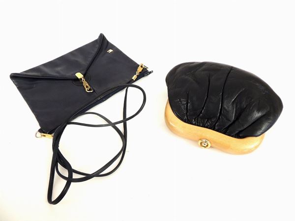 Two black and blue leather little bags