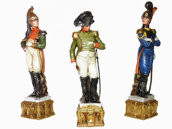 Three polychrome porcelain napoleonic figurines