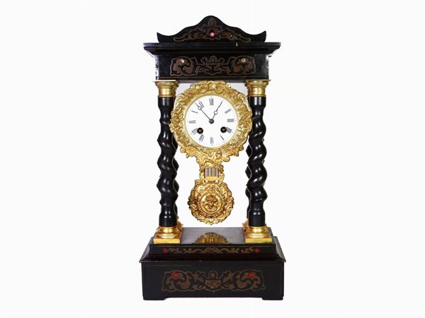 Orologio a tempietto in legno ebanizzato