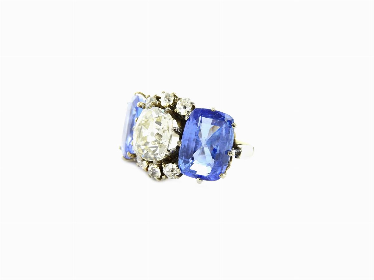 Anello Trilogy in Platino con Diamanti e Zaffiri Naturali
