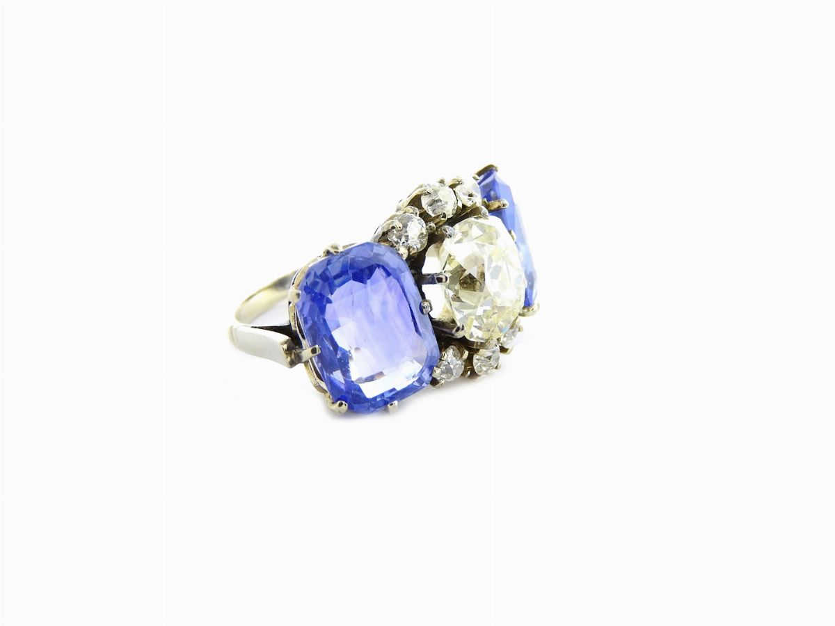 Anello Trilogy in Platino con Diamanti e Zaffiri Naturali