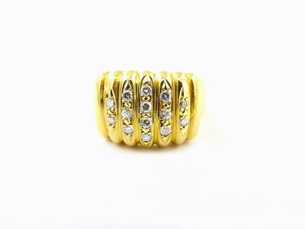 Yellow gold Torrini ring with diamonds