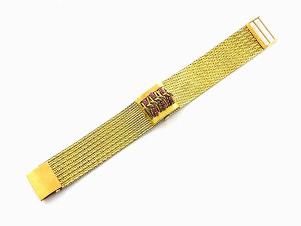 Yellow gold Constantine ladies watch bracelet with rubies