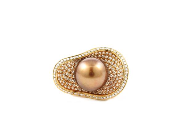 Anello in oro rosa con diamanti e perla coltivata bronzea