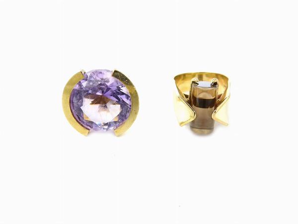 Two 9KT yellow gold design rings with amethyst and smoky quartzes