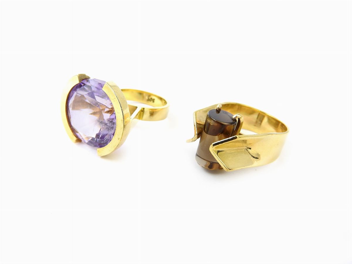Due Anelli di Design in Oro Giallo 375/1000 con Quarzi Ametista e Fumé