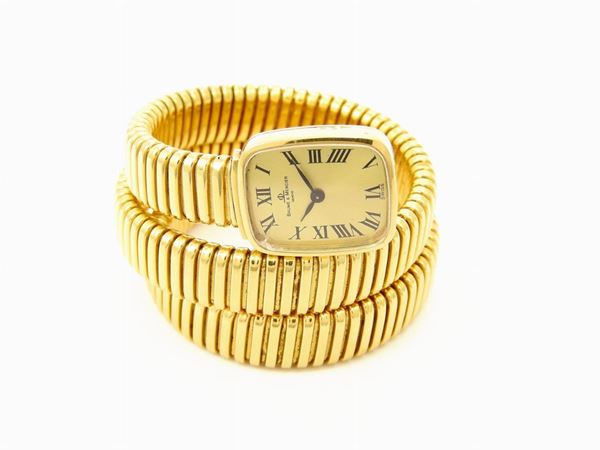 Yellow gold Weingrill tubogas bracelet with Baume & Mercier watch