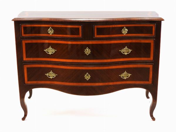 A Rosewood Veneered Chest of Drawers