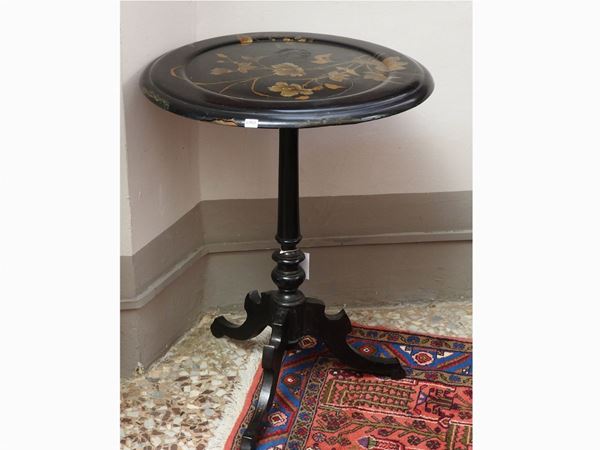 A Round Lacquer Side Table