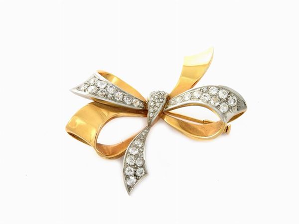 White and yellow gold Massoni brooch with diamonds