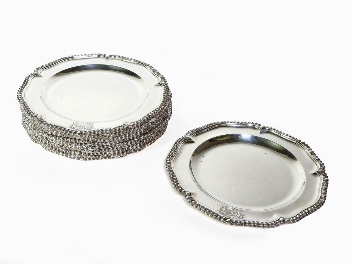 Serie di Dodici Piatti in Argento