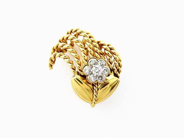 White and yellow gold Cartier brooch with diamonds