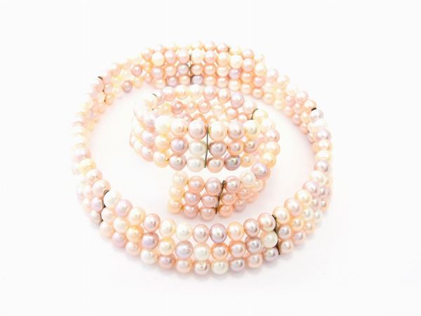 Demi parure of freshwater cultured pearls semi rigid necklace and bracelet