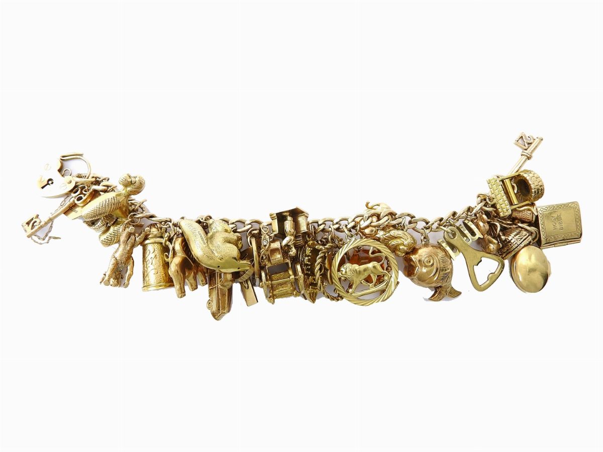 Bracciale "charms" in Oro Giallo Prevalentemente 375/1000
