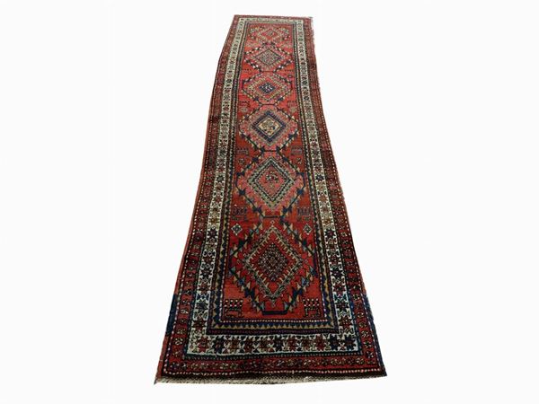 A Persian Long Carpet  (early 20th Century)  - Auction The Riz Ortolani and Katyna Ranieri collection / Forniture and Art Objects - III - III - Maison Bibelot - Casa d'Aste Firenze - Milano