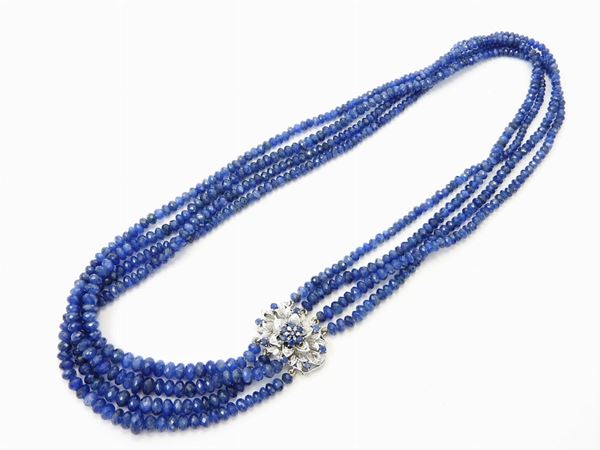 Four strands graduated sapphires necklace with white gold and sapphires clasp