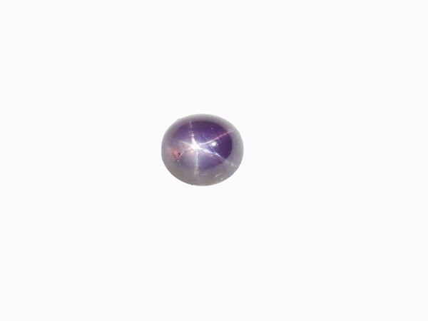 Natural light violet star corundum