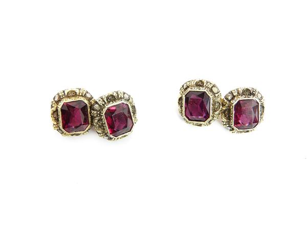 Yellow gold cuff links with diamonds and rodolite garnets