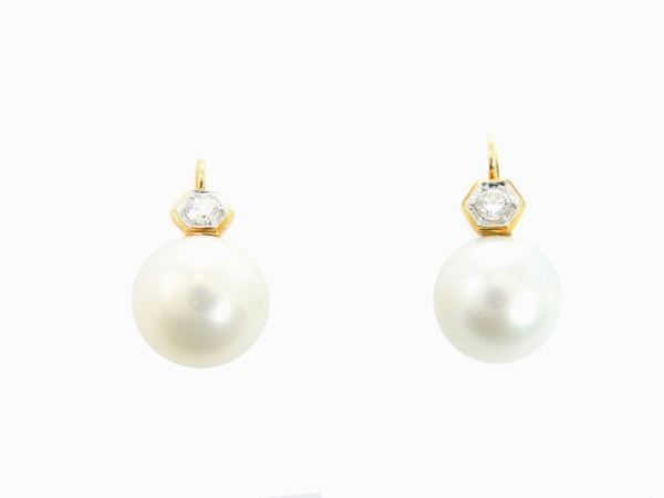 Yellow gold earrings with diamonds and South Sea cultured pearls