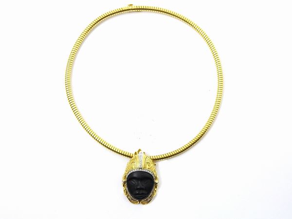 Yellow gold tubogas necklace with yellow and white gold Trovato pendant set with diamonds and onyx
