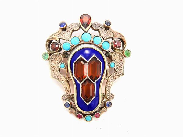 Yellow gold and silver brooch with enamel, madeira quartzes and some other stones