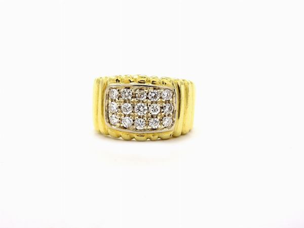 White and yellow gold pinky ring with diamonds