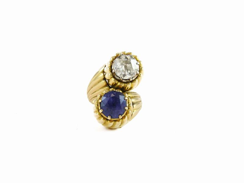Anello Contrarié in Oro Giallo con Diamante e Zaffiro Naturale