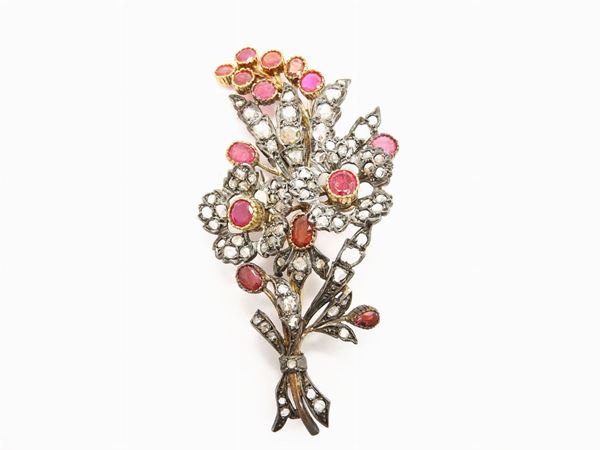 Yellow gold and silver brooch with diamonds and rubies