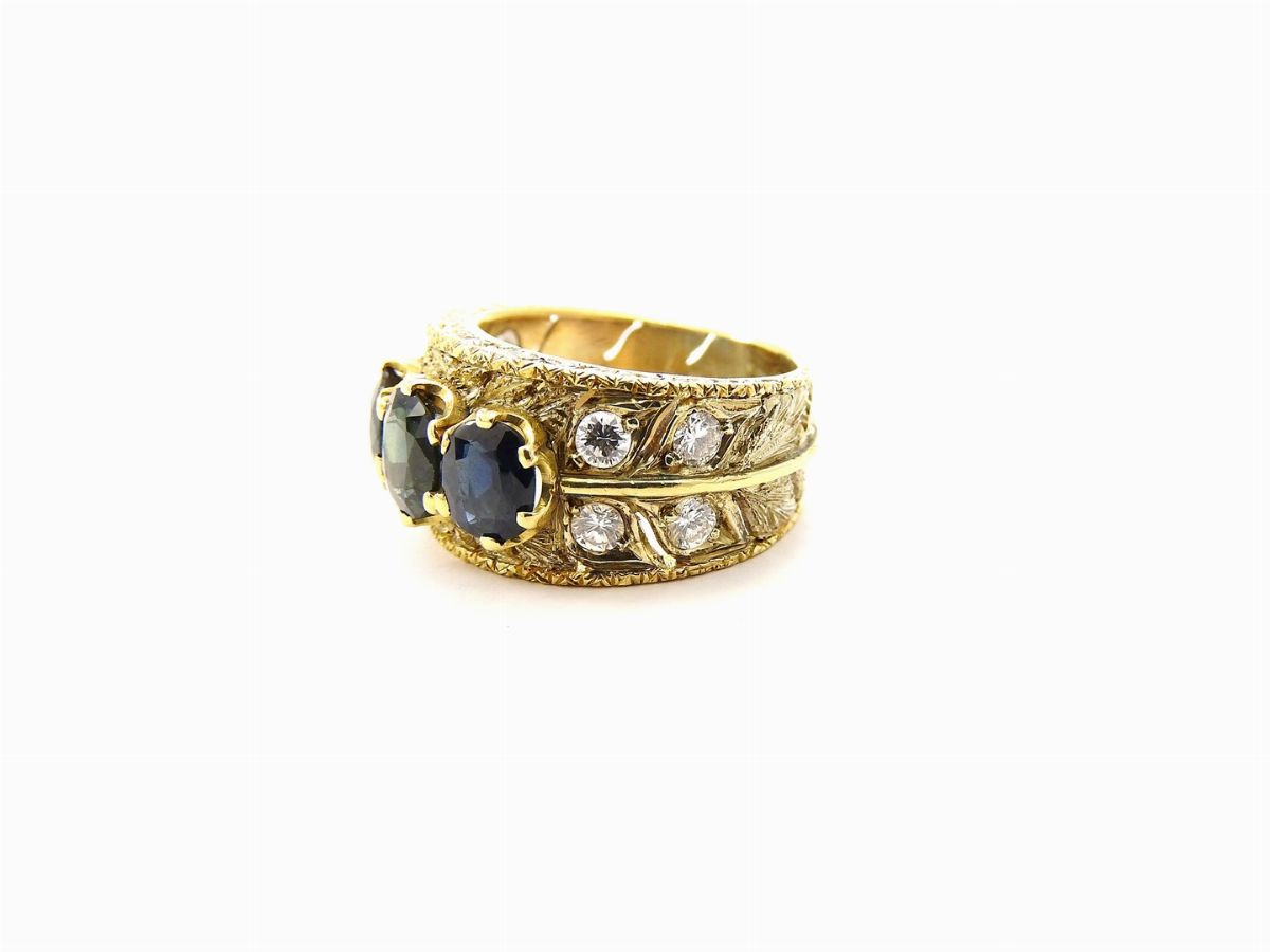 Anello a Fascia in Oro Giallo Favilli con Diamanti e Zaffiri