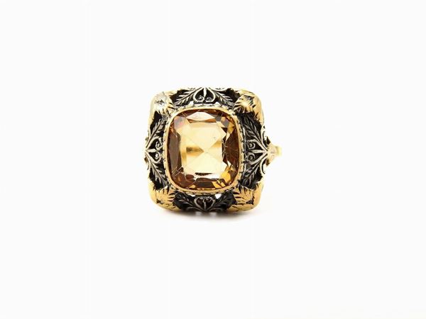 Yellow gold and silver ring with imperial topas